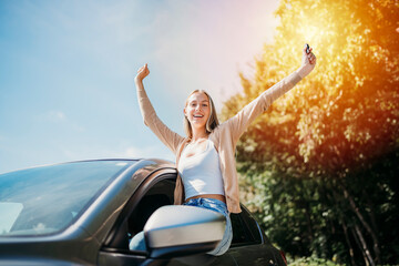car driver woman happy owner of a new car