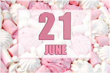 calendar date on the background of white and pink marshmallows. June 21 is the twenty first day of the month