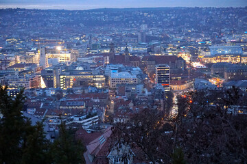 aerial view over downtown Stuttgart at dusk                              