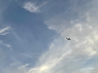 Airplane in the blue sky