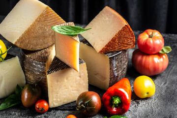 various types of Spanish manchego cheese made from cow and goat milk. International dairy delicacies