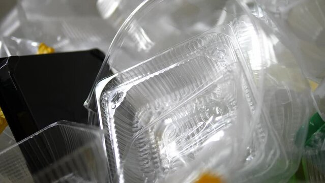 Background of plastic waste in the sorting center. Plastic products for recycling.