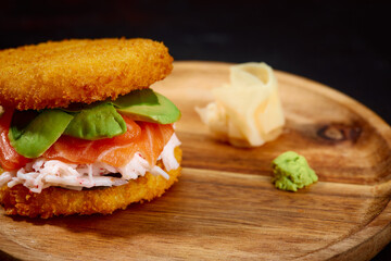 sushi menu with burger made from rice and smoked salmon, avocado, light cheese and nori
