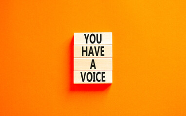 You have a voice symbol. Concept words You have a voice on wooden blocks. Beautiful orange table...