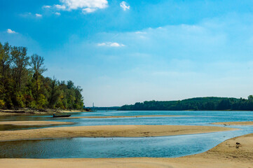 Summer Danube with sandbanks and forest