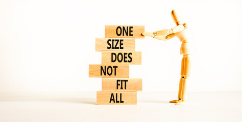 One size does not fit all symbol. Concept words One size does not fit all on wooden blocks....