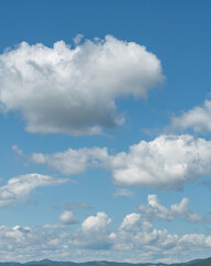 Naklejka na ściany i meble Cloudscape Background in Sunny Day With Blue Sky