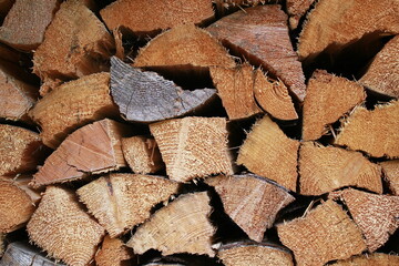 stack of firewood, woodpile texture background, chopped and stacked firewood, texture of firewood...
