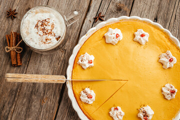 Homemade Thanksgiving Pumpkin Pie with whipped cream. banner, menu, recipe place for text, top view