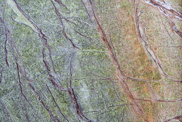 the natural stone wall background or texture