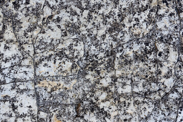 the natural stone wall background or texture