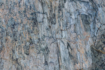 the natural stone wall background or texture