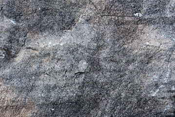 the natural stone wall background or texture