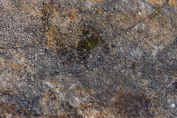 the natural stone wall background or texture