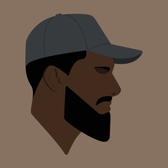 Silhouette. Portrait. Face. Black man head. Man head flat colored illustration. Head silhouette. Bearded black man. The head of a black guy in a baseball cap.
