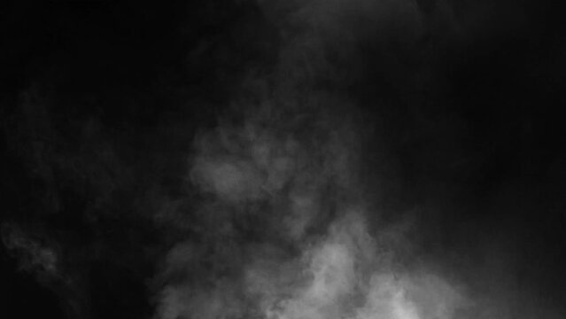 Abstract white smoke in slow motion. Smoke, Cloud of cold fog in light spot background. Light, white, fog, cloud, black background, 4k, ice smoke cloud. Floating fog.	