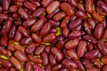 Abstract food background, raw red beans closeup.