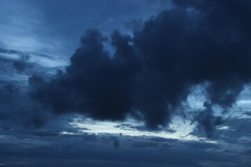 Obraz premium dark blue cloud with white light sky background and midnight evening time 
