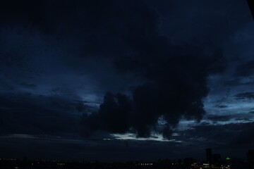 Naklejka na ściany i meble dark blue cloud with white light sky background and midnight evening time 
