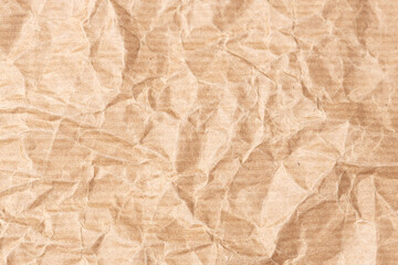 Crumpled Kraft paper texture background. Full frame