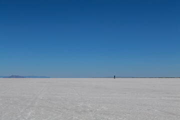 Salt Flats in Utah. Salt Flats Landscape. Blue Sky and Snow-White Salt Soil. Bonneville Salt Flats. High quality photo