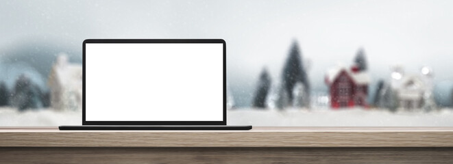 laptop on a wooden table on a christmas day background - transparent PNG