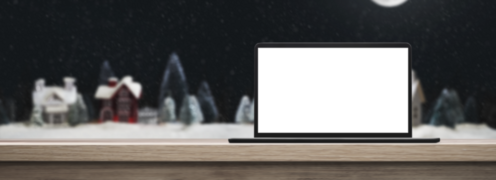 laptop on a wooden table on a night background at christmas - transparent PNG