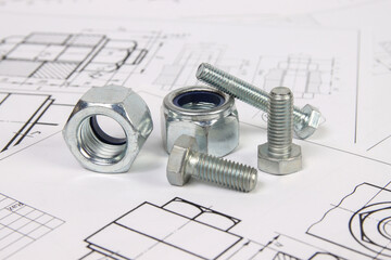 Technical drawings of bolt and nut. Engineering, technology and metalworking. Metal bolt and nut on...