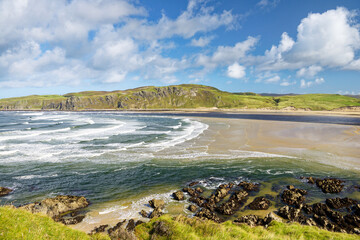 Isle of Doagh looking N.E. over entrance to Trawbreaga Bay to Five Finger Strand and crags of...