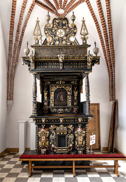 Aisle of St. John Evangelist church Kosciol Sw. Jana Ewangelisty in historic old town center of Bartoszyce in Poland