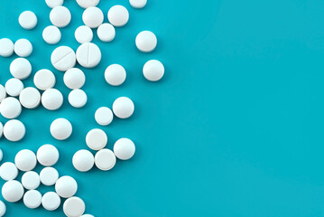 Medical pills on a blue background. Medical preparations. Health