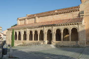 Fototapeta na wymiar Atrium and entrance with semicircular Romanesque arches of the Romanesque church of San Millán in Segovia. Spain