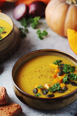 Bowls served with seasonal pumpkin soup	