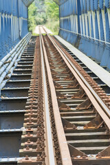 Fototapeta premium railway in the countryside. Blue. Iron
