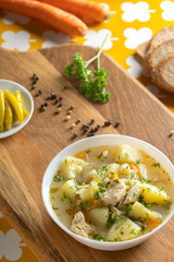 Chicken soup with potatoes and noodles