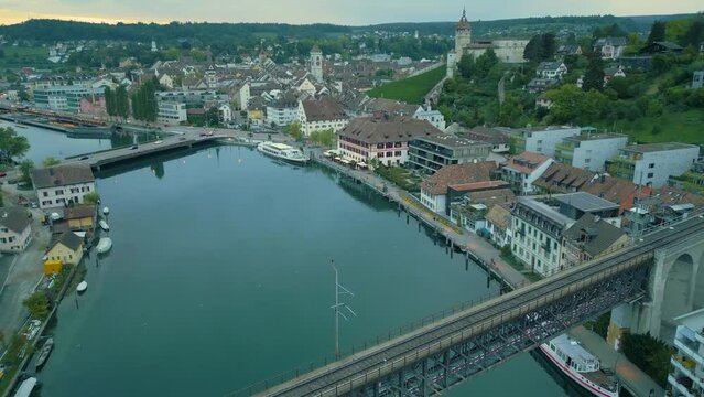 Drone shot of Schaffhausen city centre with rail bridge and Munot fortress