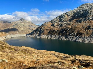 Artificial reservoir lake Lago di Lucendro or accumulation lake Lucendro in the Swiss alpine area of the St. Gotthard Pass (Gotthardpass), Airolo - Canton of Ticino (Tessin), Switzerland (Schweiz)