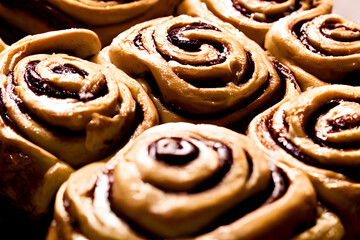 photo of cinnamon rolls, a sweet baked dessert, filling pastry