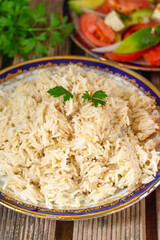 Rice pilaf / pilau cooked in broth with parsley