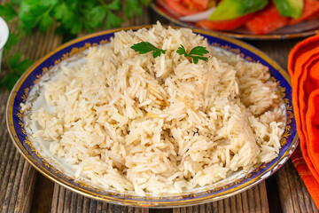 Rice pilaf / pilau cooked in broth with parsley - 539827029