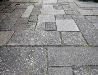 Texture pattern tile stone boulder garden parking street alley path grass bush foliage leaves bush wall bench curb architecture home decor