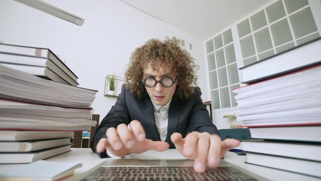 POV of nerdy office worker using laptop, overwhelmed employee, too much work