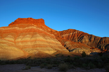 Fototapeta premium Standing in deep shadow - Old Paria Movie Set, Utah