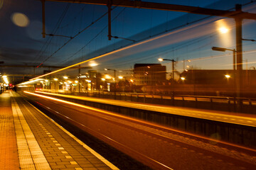 Fototapeta na wymiar Train at speed by night
