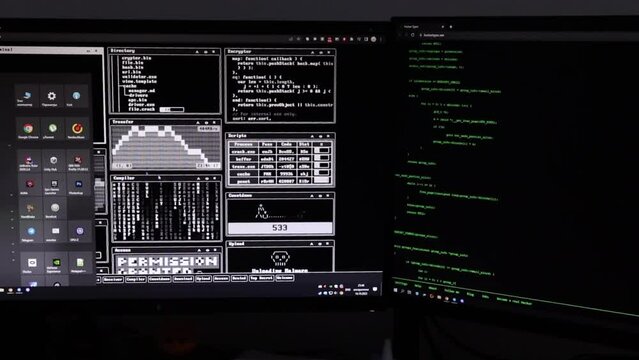 Programmer's code on the monitor. programmer working on computer