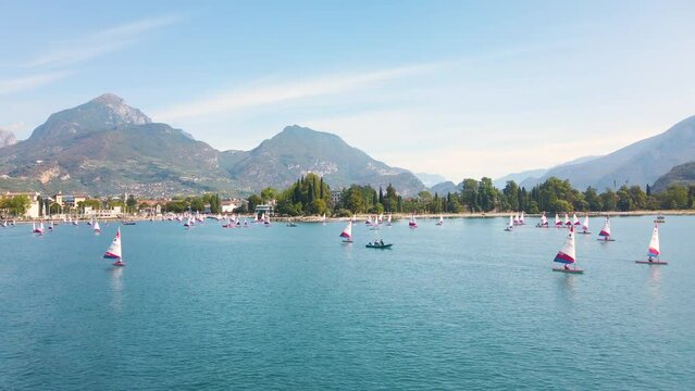 Optimist dinghies sailing on Lake Garda 4K stock video 2