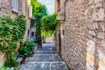 Fototapeta na wymiar Walking in the picturesque streets of Saint-Paul-de-Vence, Cote d'Azur, France