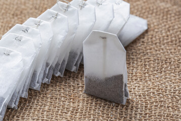 Tea bags with herbs for tea on the table.