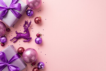 Christmas concept. Top view photo of purple gift boxes with ribbon bows pink violet baubles reindeer ornament and confetti on isolated pastel pink background with copyspace