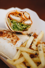Burrito with grilled chicken and vegetables pita bread, shawarma